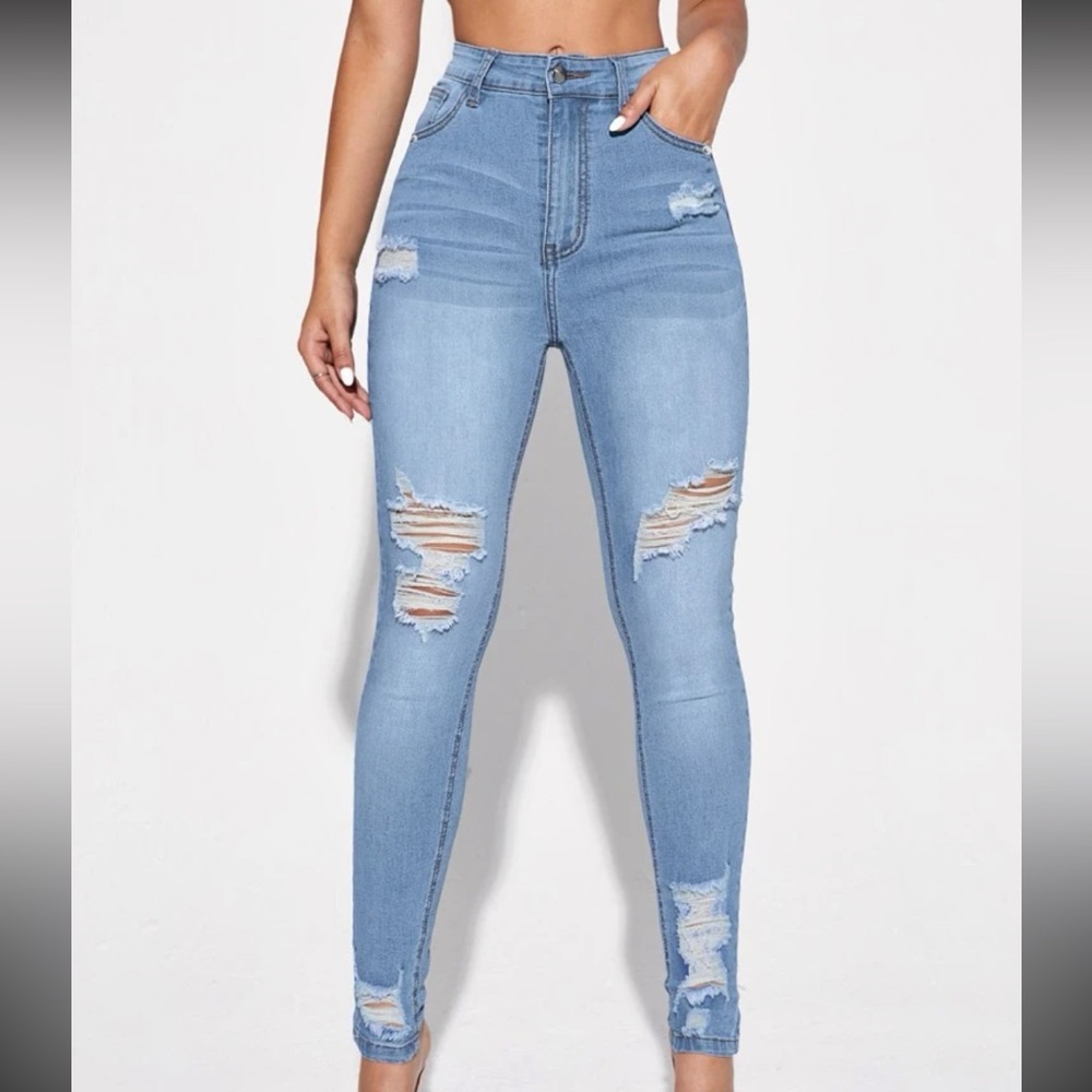 Light wash high waisted distressed jeans